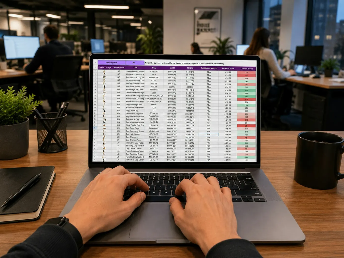 Hands typing on a laptop showing a stock spreadsheet, in an open-plan office where colleagues work at their own screens